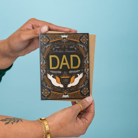 100 Proof Father's Day greeting card held in hand