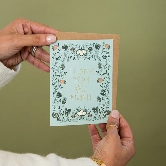 Thank You Flowers greeting card held in hand