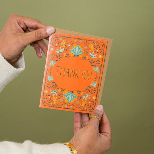 Thank You Sunny Blooms greeting card held in hand