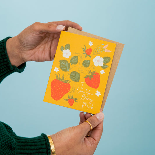 Strawberry Love greeting card held in hand