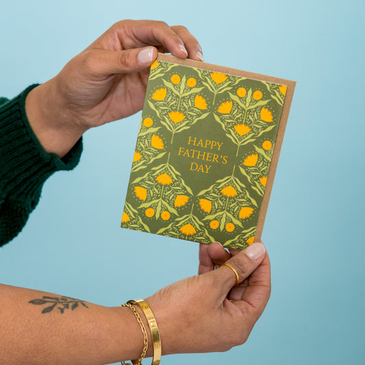 Sunflower Father's Day greeting card held in hand