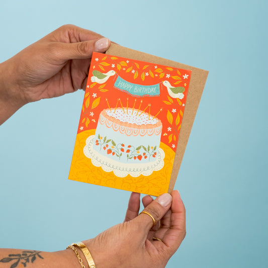 Strawberry Cake Birthday greeting card held in hand