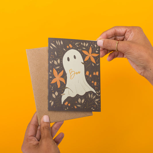 Halloween Ghosts greeting card held in hand