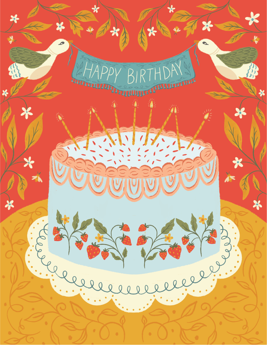 Strawberry Cake Birthday Greeting Card featuring a hand-illustrated blue cake with strawberry details, lit candles, and two birds holding a “Happy Birthday” banner on a bold red background with floral accents.