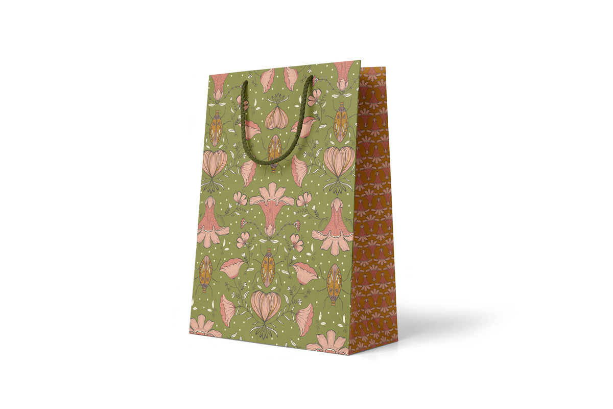 Love Bug Large Gift Bag, hand-illustrated golden love bugs and delicate florals on rich green by Amita Nair