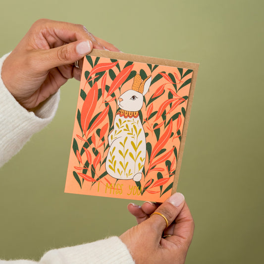 Miss You Bunny greeting card held in hand
