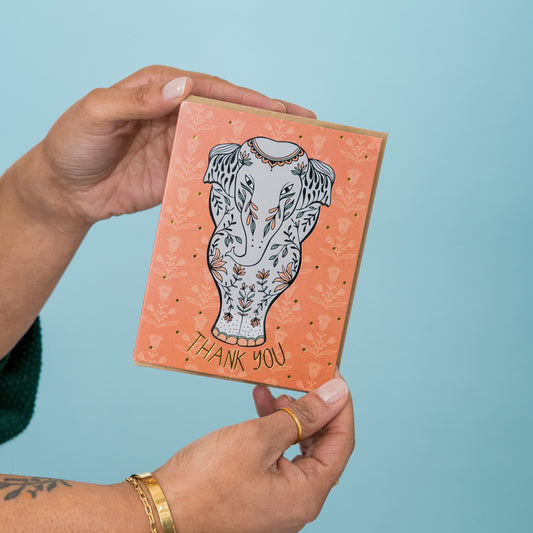 Elephant Thank You greeting card held in hand