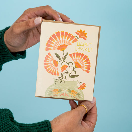 Diwali Bouquet greeting card held in hand
