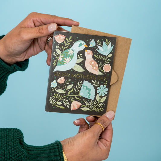 Mother's Day Birds & Blooms greeting card held in hand
