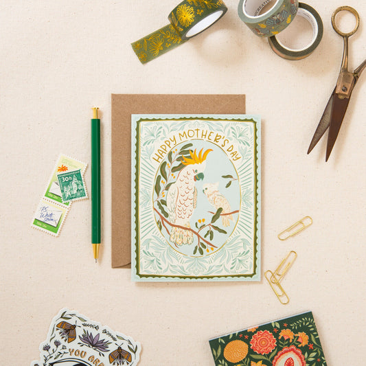 Cockatoo Love Mother's Day greeting card on linen, hand-illustrated by Amita Nair
