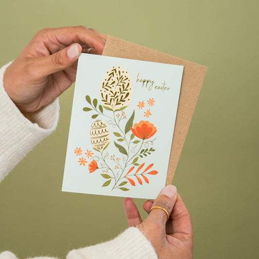 Easter Elegance greeting card held in hand