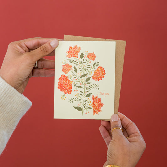 Love You Flowers greeting card held in hand
