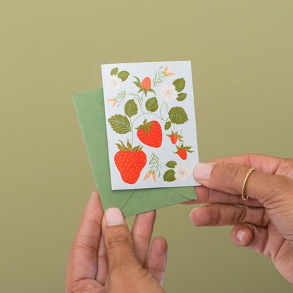 Strawberry mini card held in hand