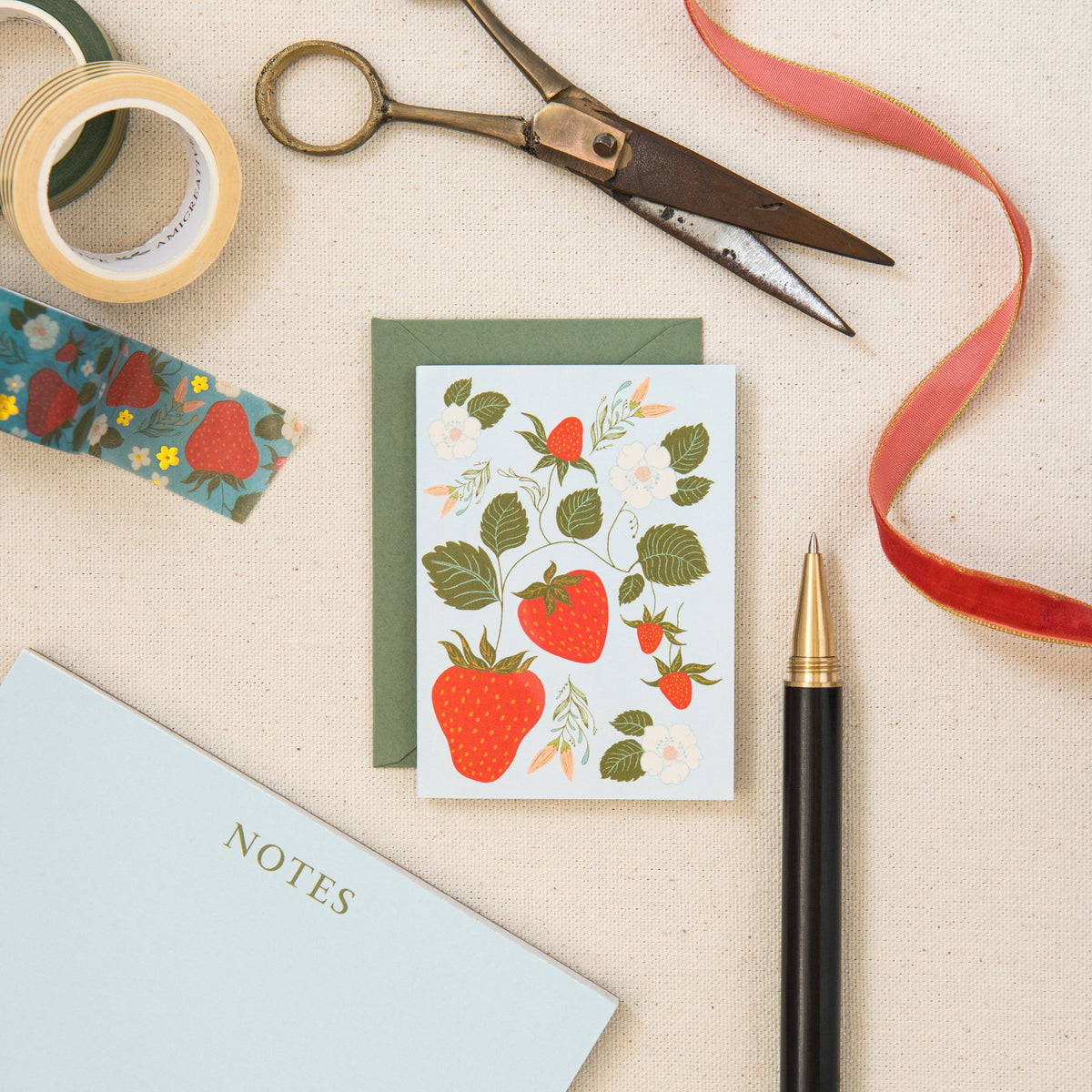 Strawberry mini card on linen, hand-illustrated by Amita Nair
