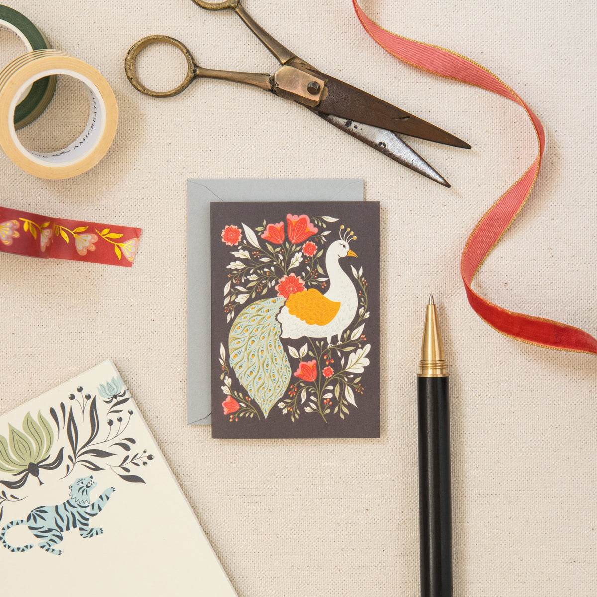 Peacock Garden mini card on linen, hand-illustrated by Amita Nair