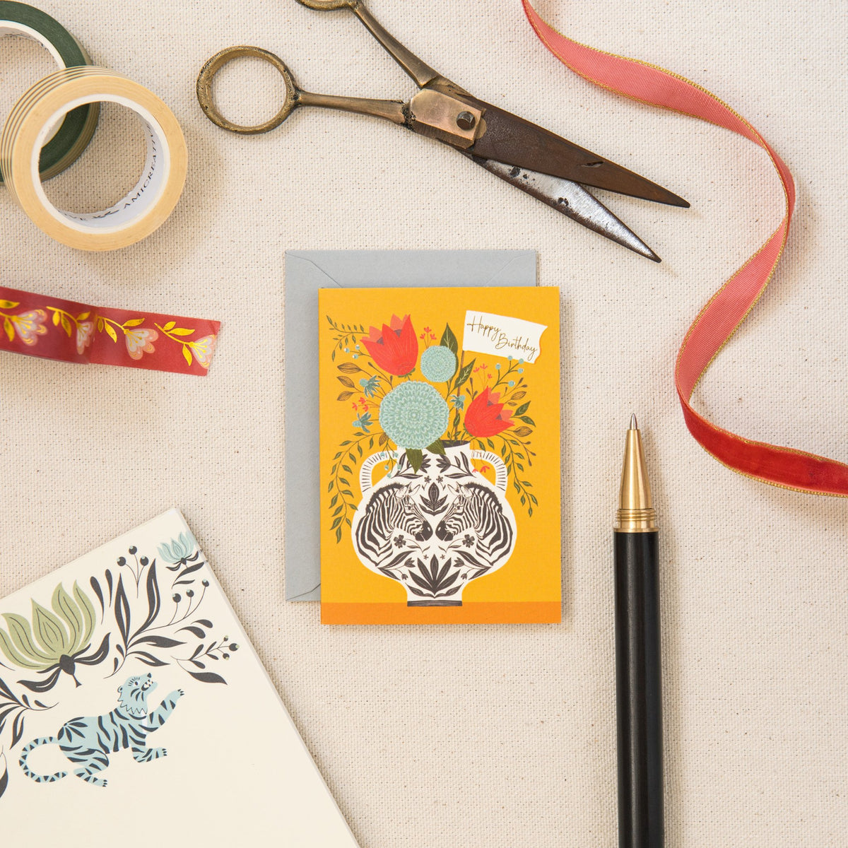 Zebra Birthday mini card on linen, hand-illustrated by Amita Nair