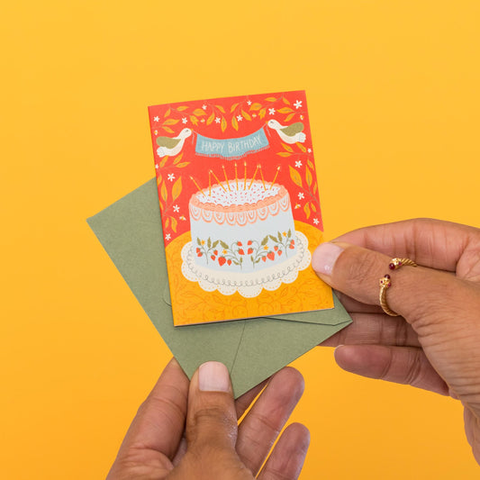 Strawberry Cake mini card held in hand