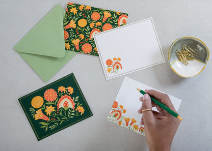Green Botanicals notecard held in hand