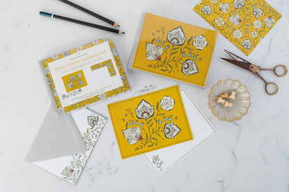 Ochre Garden notecard set in its clear gift box with cards and envelopes, hand-illustrated by Amita Nair