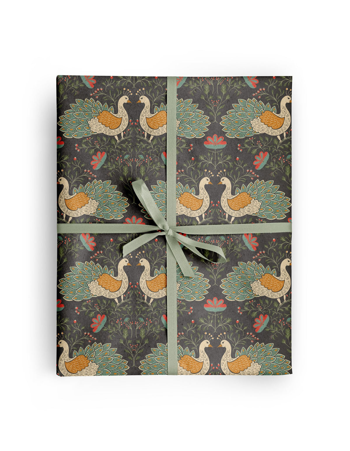 Peacock Garden Wrapping Paper wrapped around a gift, hand-illustrated cream and teal peacocks with coral blooms on deep charcoal by Amita Nair