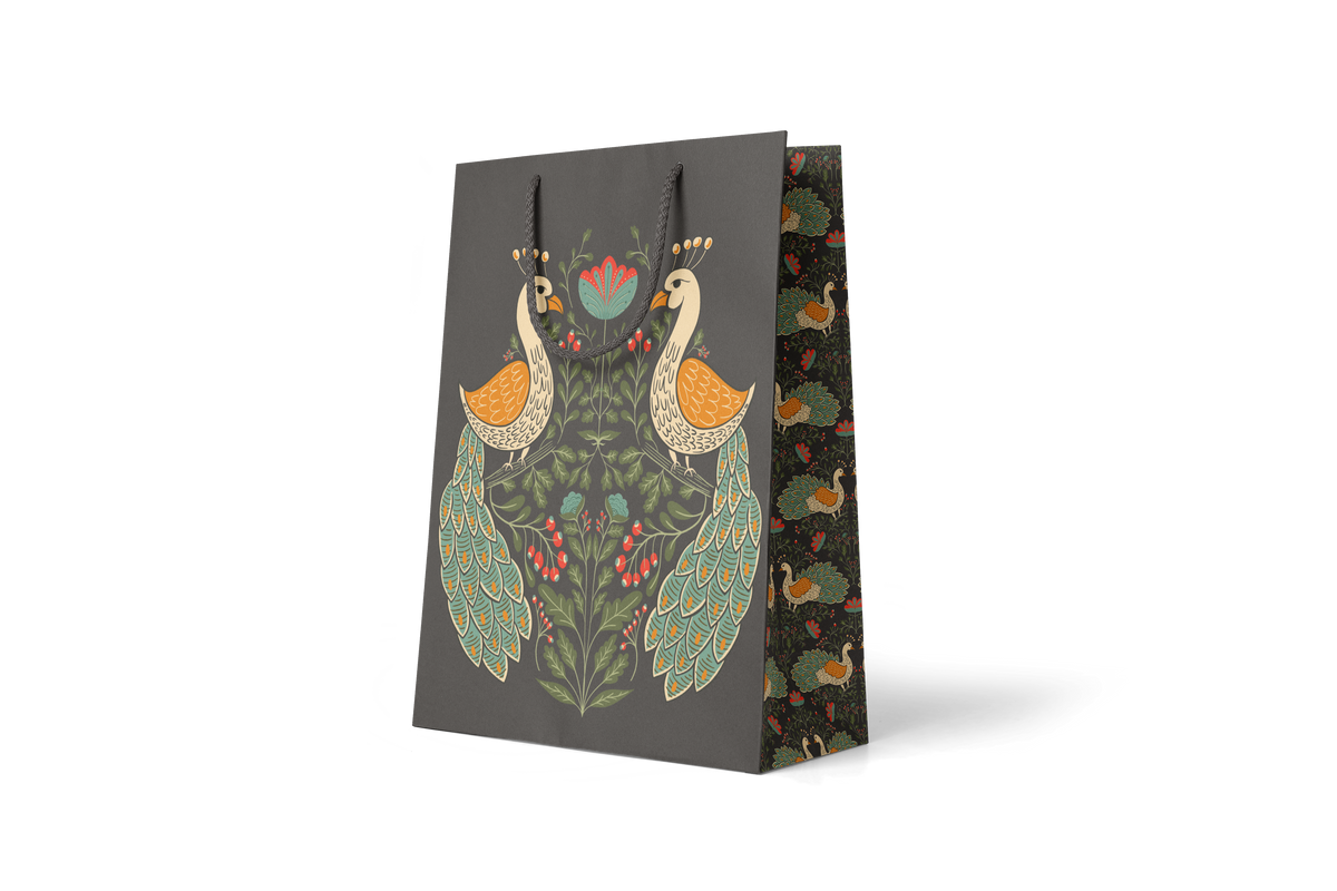 Peacock Garden Large Gift Bag, hand-illustrated peacocks among layered florals on deep charcoal by Amita Nair